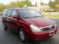 2011 Claret Red Kia Sedona LX  photo #15