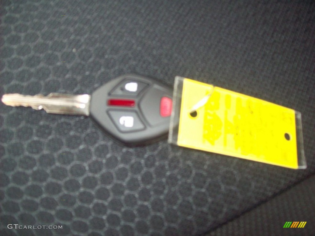 2011 Outlander Sport ES - Rally Red Metallic / Black photo #13