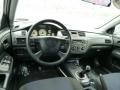 Black 2003 Mitsubishi Lancer OZ Rally Dashboard