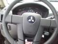 2011 Mitsubishi Endeavor Black Interior Steering Wheel Photo