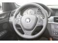 2011 BMW X3 Black Interior Steering Wheel Photo