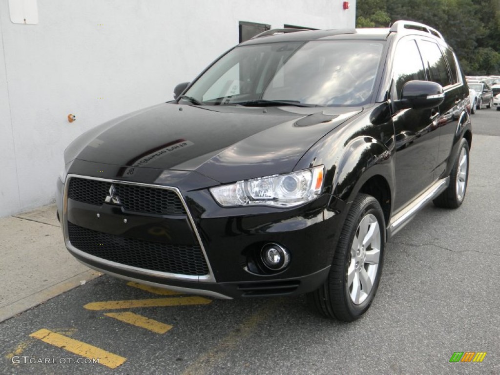 2010 Outlander XLS 4WD - Labrador Black Pearl / Black photo #1