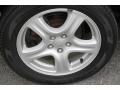 2004 Subaru Impreza Outback Sport Wagon Wheel and Tire Photo