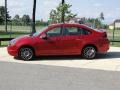 2010 Sangria Red Metallic Ford Focus SES Sedan  photo #8