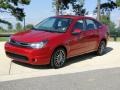 2010 Sangria Red Metallic Ford Focus SES Sedan  photo #10