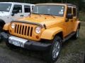 2012 Dozer Yellow Jeep Wrangler Unlimited Sahara 4x4  photo #1