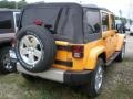 2012 Dozer Yellow Jeep Wrangler Unlimited Sahara 4x4  photo #2