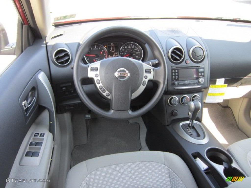 2011 Rogue SV AWD - Cayenne Red / Gray photo #15