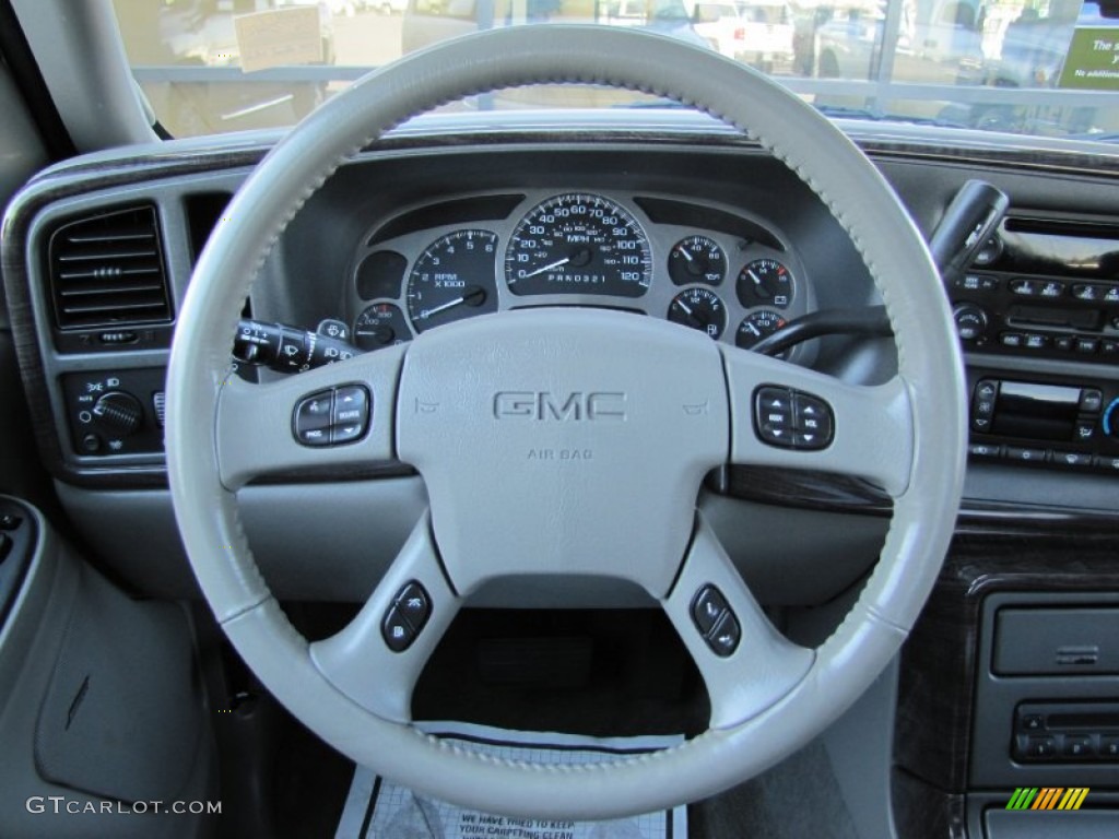2006 GMC Sierra 1500 Denali Crew Cab 4WD Stone Gray leather Steering Wheel Photo #54676374