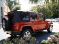 2009 Sunburst Orange Pearl Jeep Wrangler Unlimited Sahara 4x4  photo #7