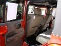 2009 Sunburst Orange Pearl Jeep Wrangler Unlimited Sahara 4x4  photo #11
