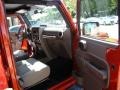 2009 Sunburst Orange Pearl Jeep Wrangler Unlimited Sahara 4x4  photo #15