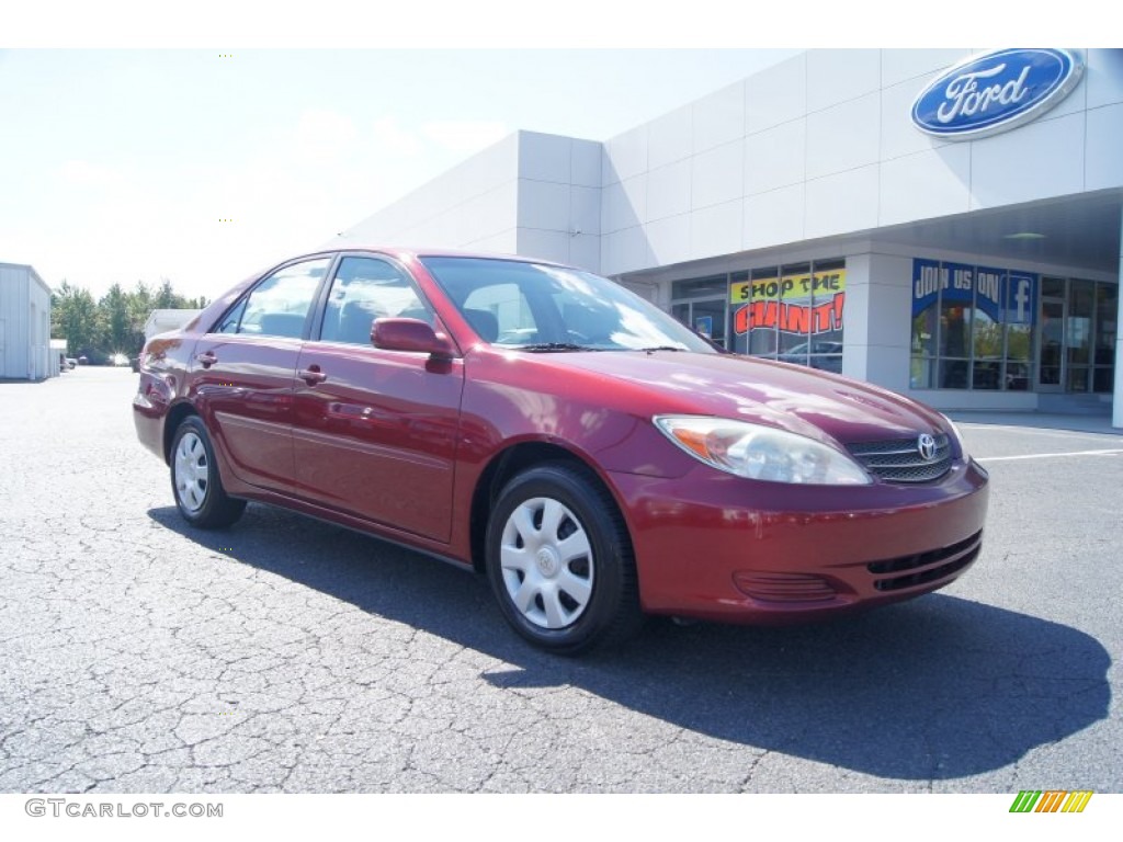 2002 Camry LE - Salsa Red Pearl / Taupe photo #1