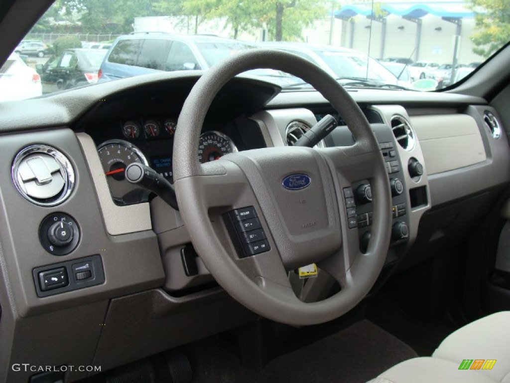 2010 Ford F150 XLT SuperCrew 4x4 Medium Stone Steering Wheel Photo #54693082