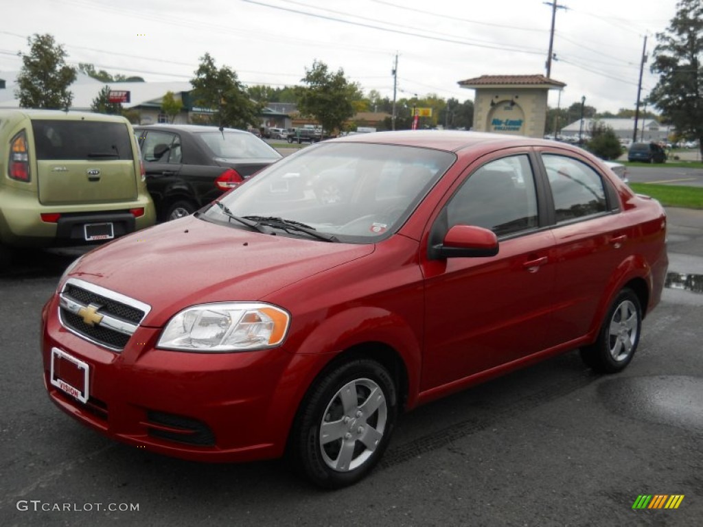 2010 Aveo LT Sedan - Sport Red / Charcoal photo #1