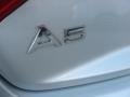 2010 Audi A5 2.0T quattro Coupe Badge and Logo Photo
