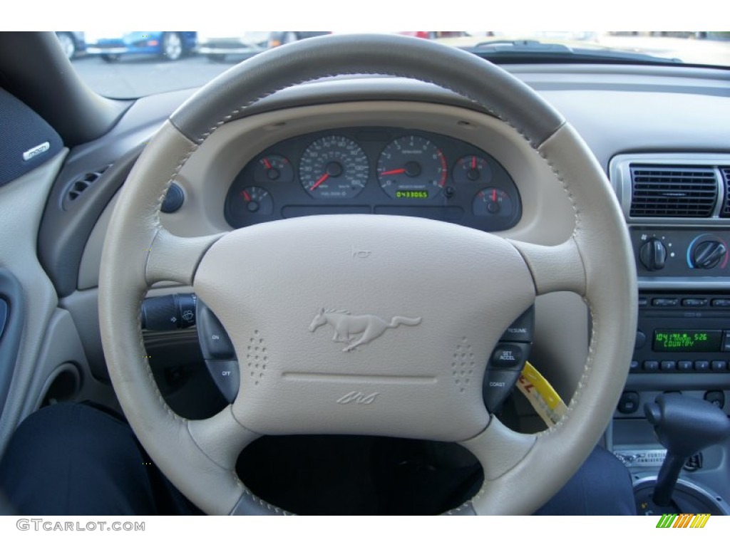 2004 Ford Mustang GT Coupe Medium Parchment Steering Wheel Photo #54747402