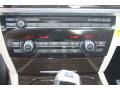 Oyster/Black Controls Photo for 2012 BMW 7 Series #54758046
