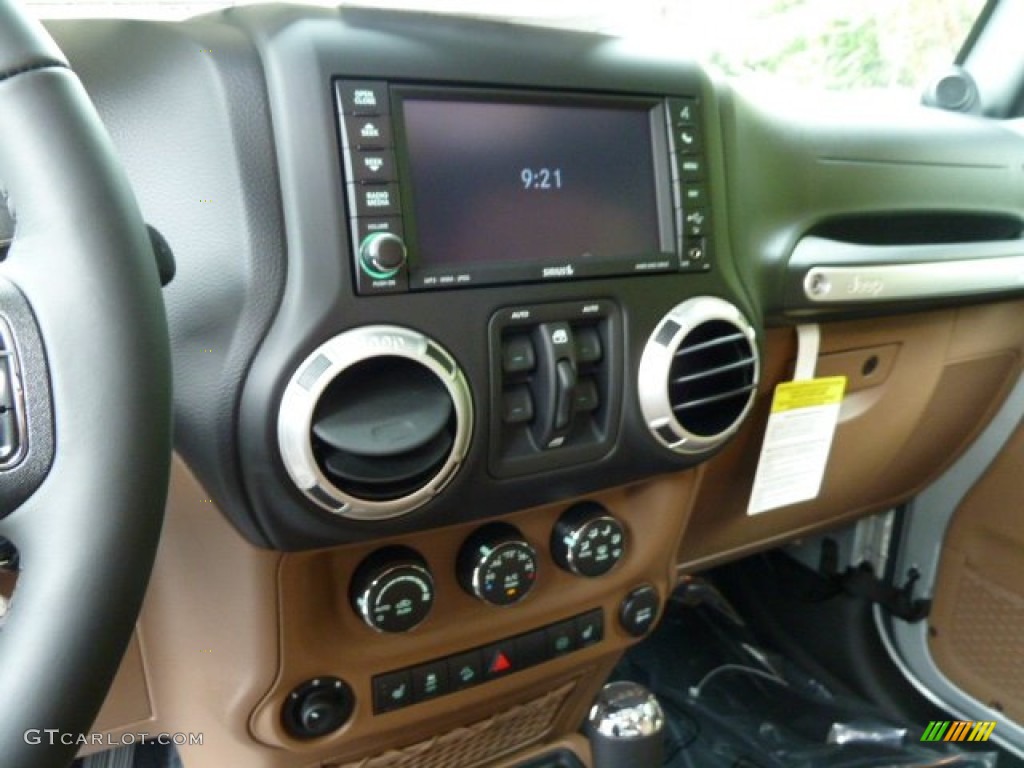 2012 Jeep Wrangler Unlimited Sahara 4x4 Black/Dark Saddle Dashboard Photo #54765315