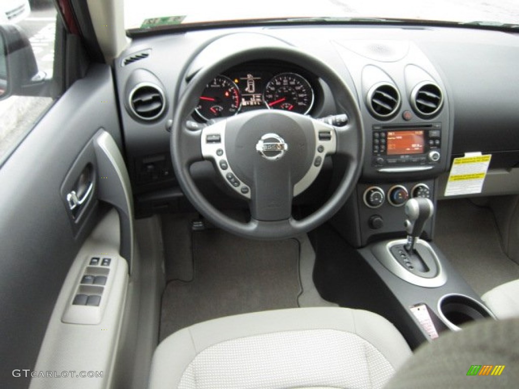 2011 Rogue SV AWD - Cayenne Red / Gray photo #14