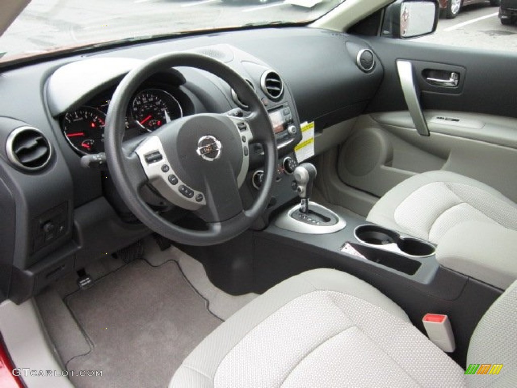 2011 Rogue SV AWD - Cayenne Red / Gray photo #16
