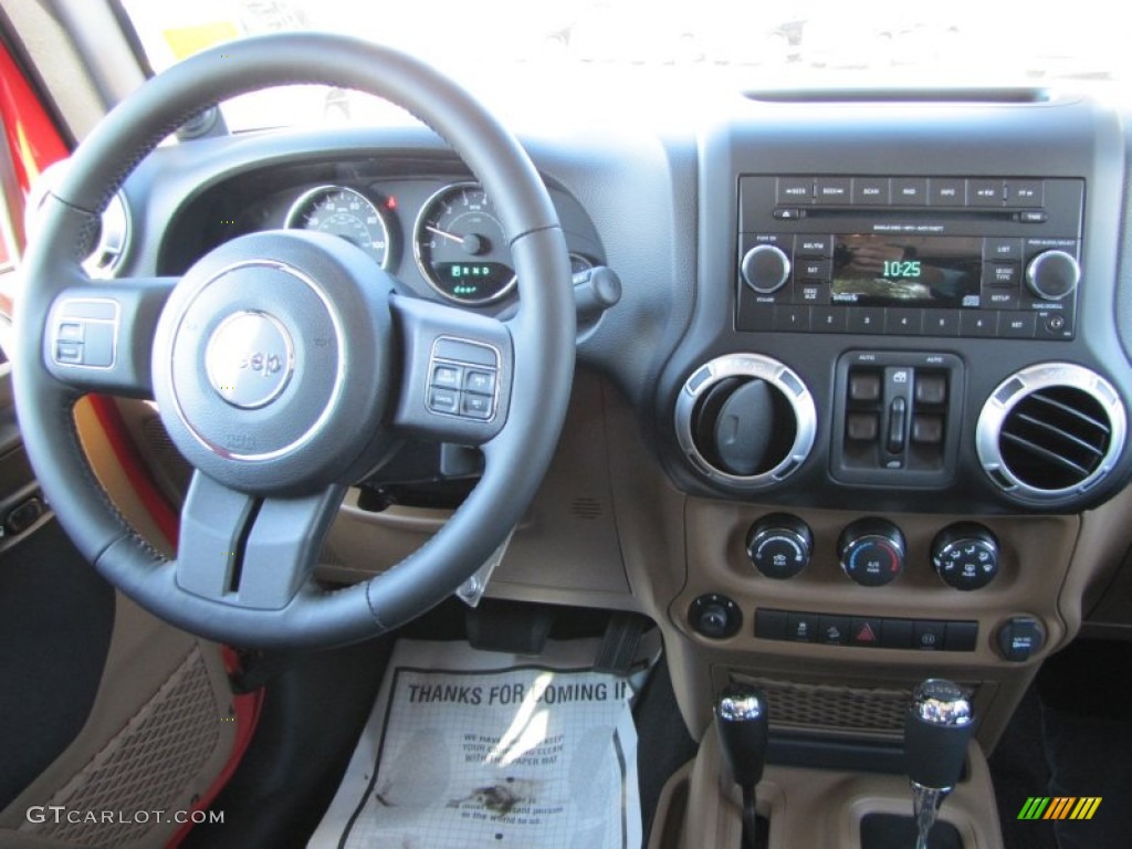 2012 Jeep Wrangler Unlimited Sahara 4x4 Black/Dark Saddle Dashboard Photo #54796765