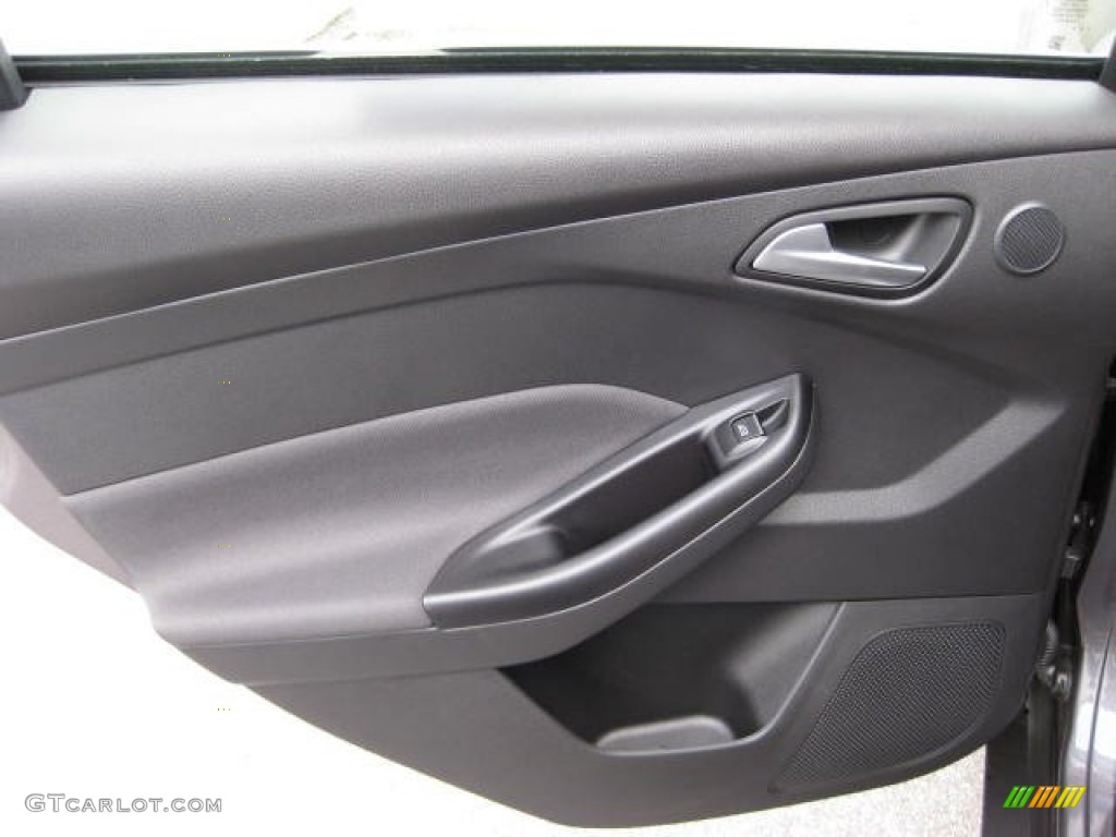 2012 Ford Focus Titanium Sedan Charcoal Black Leather Door Panel Photo #54810694