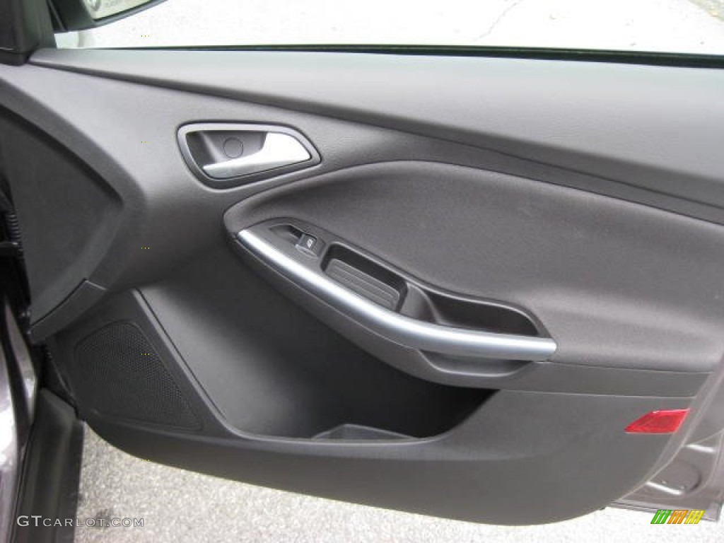 2012 Ford Focus Titanium Sedan Charcoal Black Leather Door Panel Photo #54810718
