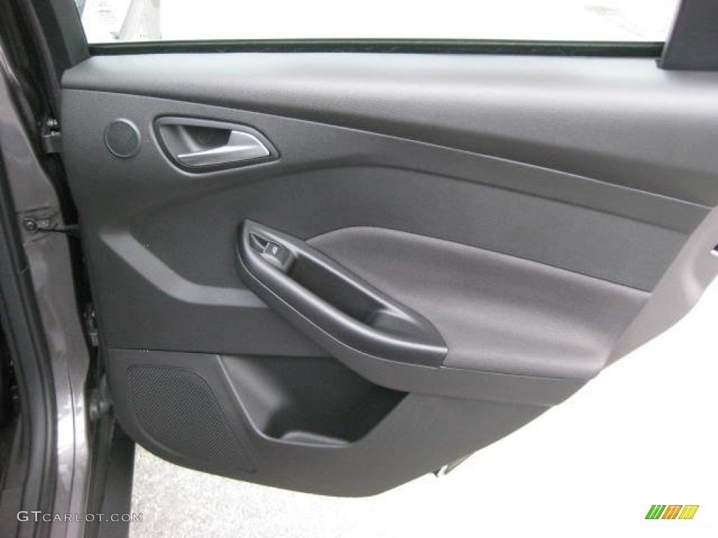 2012 Ford Focus Titanium Sedan Charcoal Black Leather Door Panel Photo #54810744