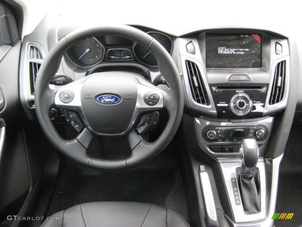 2012 Ford Focus Titanium Sedan Charcoal Black Leather Dashboard Photo #54810751