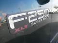 2002 Ford F250 Super Duty XLT SuperCab 4x4 Badge and Logo Photo