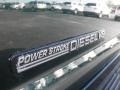 2002 Ford F250 Super Duty XLT SuperCab 4x4 Badge and Logo Photo