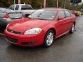 2011 Victory Red Chevrolet Impala LT  photo #2