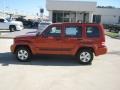 2009 Sunburst Orange Pearl Jeep Liberty Sport  photo #2