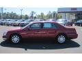 2010 Crystal Red Tintcoat Cadillac DTS   photo #2