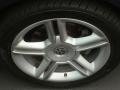 2004 Volkswagen New Beetle GLS 1.8T Coupe Wheel and Tire Photo