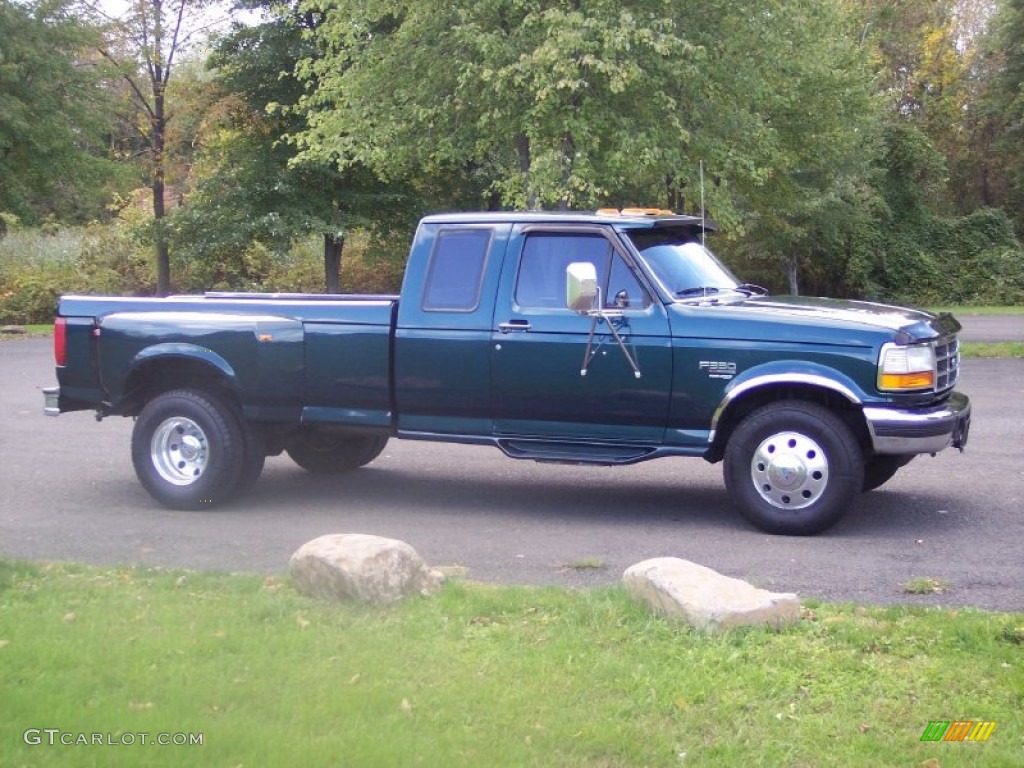 1997 F350 XLT Extended Cab Dually - Pacific Green Metallic / Medium Mocha photo #1