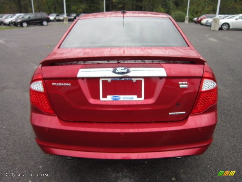 2011 Fusion SEL V6 AWD - Red Candy Metallic / Medium Light Stone photo #6
