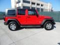 2010 Flame Red Jeep Wrangler Unlimited Rubicon 4x4  photo #2