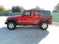 2010 Flame Red Jeep Wrangler Unlimited Rubicon 4x4  photo #6