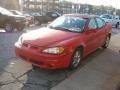 1999 Bright Red Pontiac Grand Am GT Sedan  photo #4