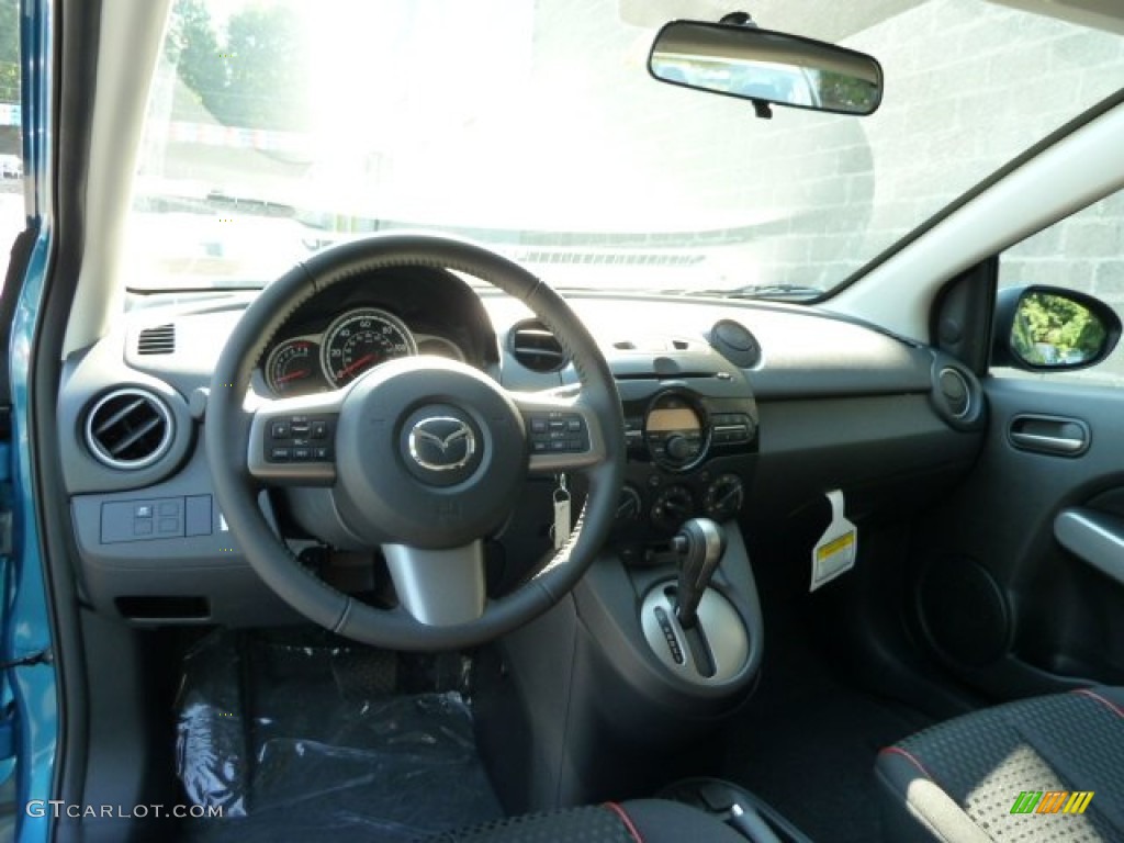 2011 Mazda MAZDA2 Touring Black Dashboard Photo #54975121