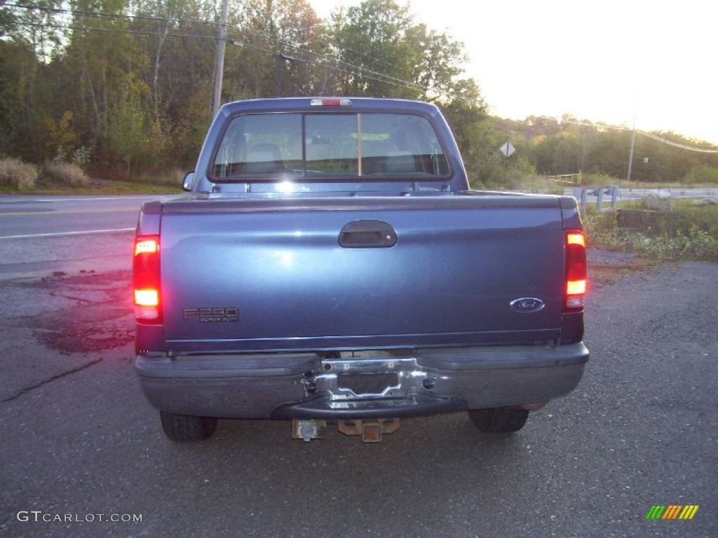 2004 F250 Super Duty FX4 Crew Cab 4x4 - Medium Wedgewood Blue Metallic / Medium Flint photo #6