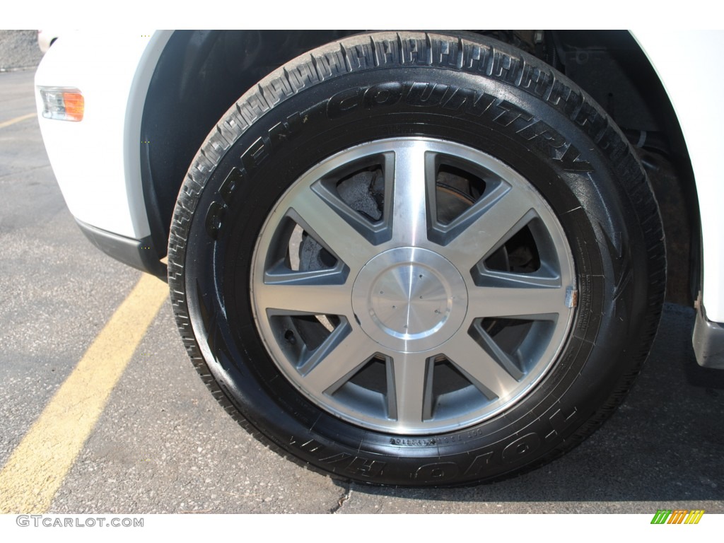 2004 Rainier CXL AWD - Olympic White / Light Cashmere photo #36