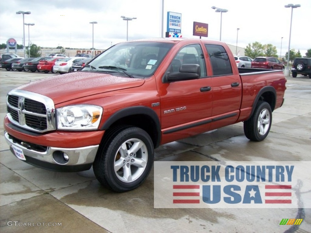 2007 Ram 1500 SLT Quad Cab 4x4 - Sunburst Orange Pearl / Medium Slate Gray photo #1