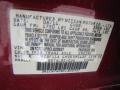 NAC: Red Brick 2012 Nissan Versa 1.6 SV Sedan Color Code