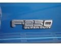 2002 Ford F250 Super Duty XLT Crew Cab Badge and Logo Photo