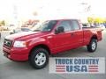 2005 Bright Red Ford F150 STX SuperCab 4x4  photo #1