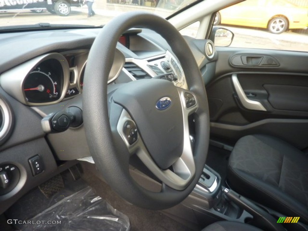 2012 Ford Fiesta SE Sedan Charcoal Black Steering Wheel Photo #55128717