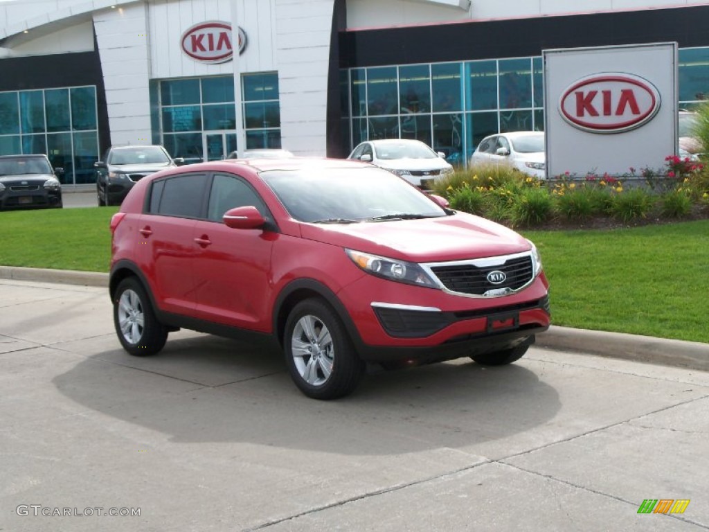 2012 Sportage LX - Signal Red / Black photo #1